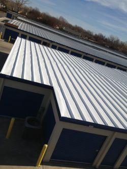 SureCoat roof coating over a flat metal roof